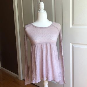 Pink babydoll long sleeve knit top.